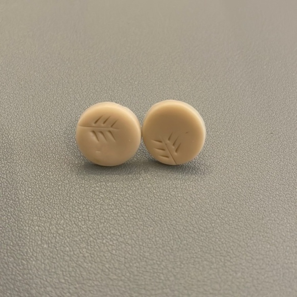 Cream circular earrings